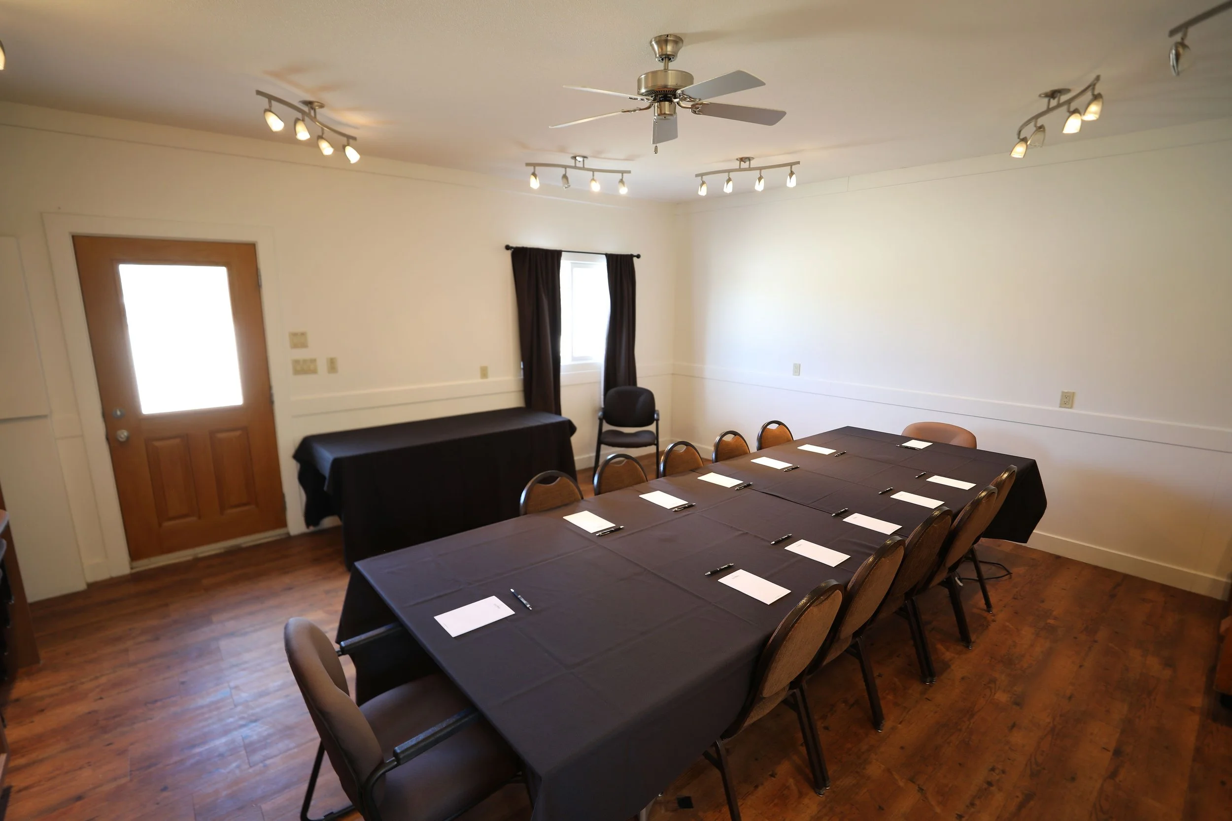 Conference room with a long table covered for a seasonal event
