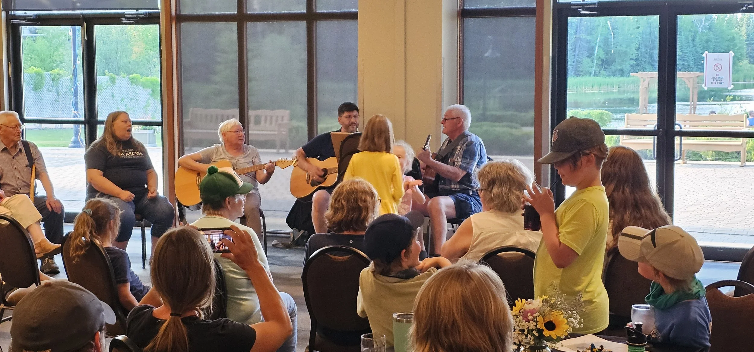 A family gathered together outdoors at Elk Ridge Resort
