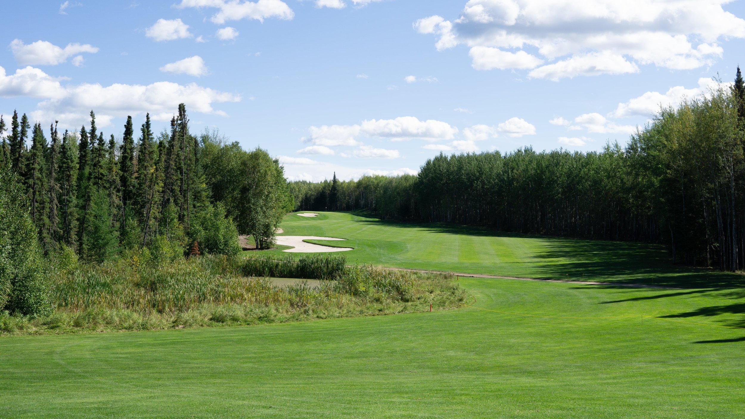 Green and fairway on one of the three nine-hole courses at Elk Ridge Resort
